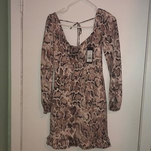 Beautiful dynamite dress. Never worn with tag on